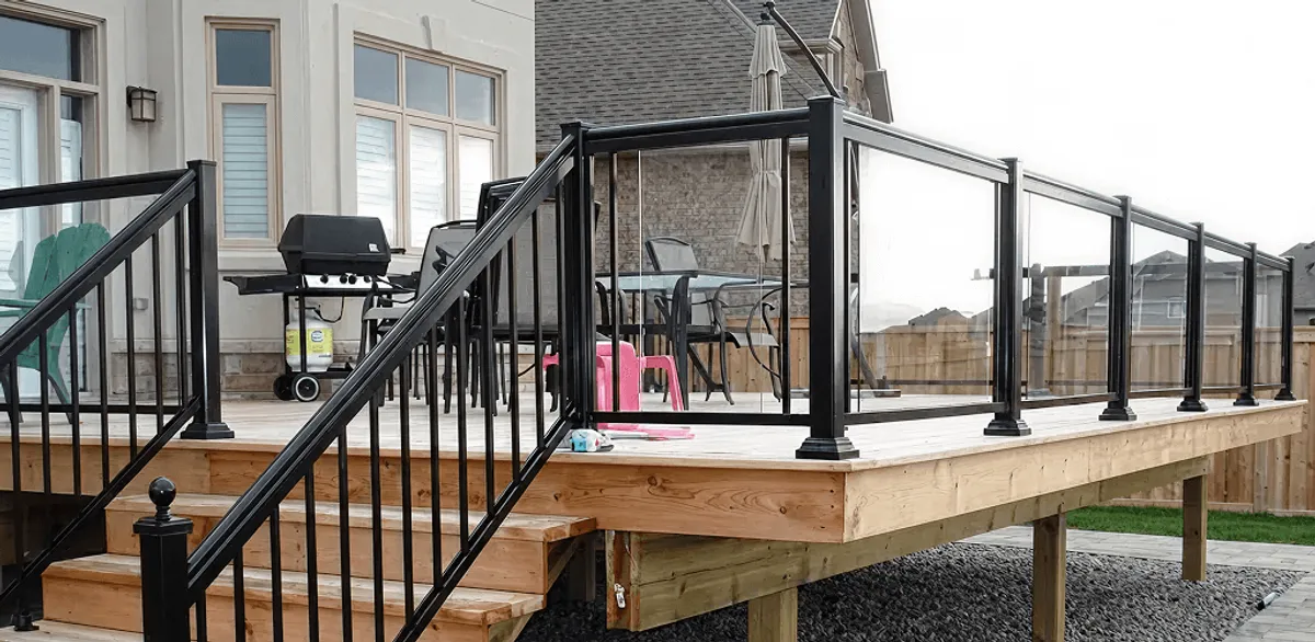 Handrail installation on a deck staircase for safety and code compliance in Duluth, MN